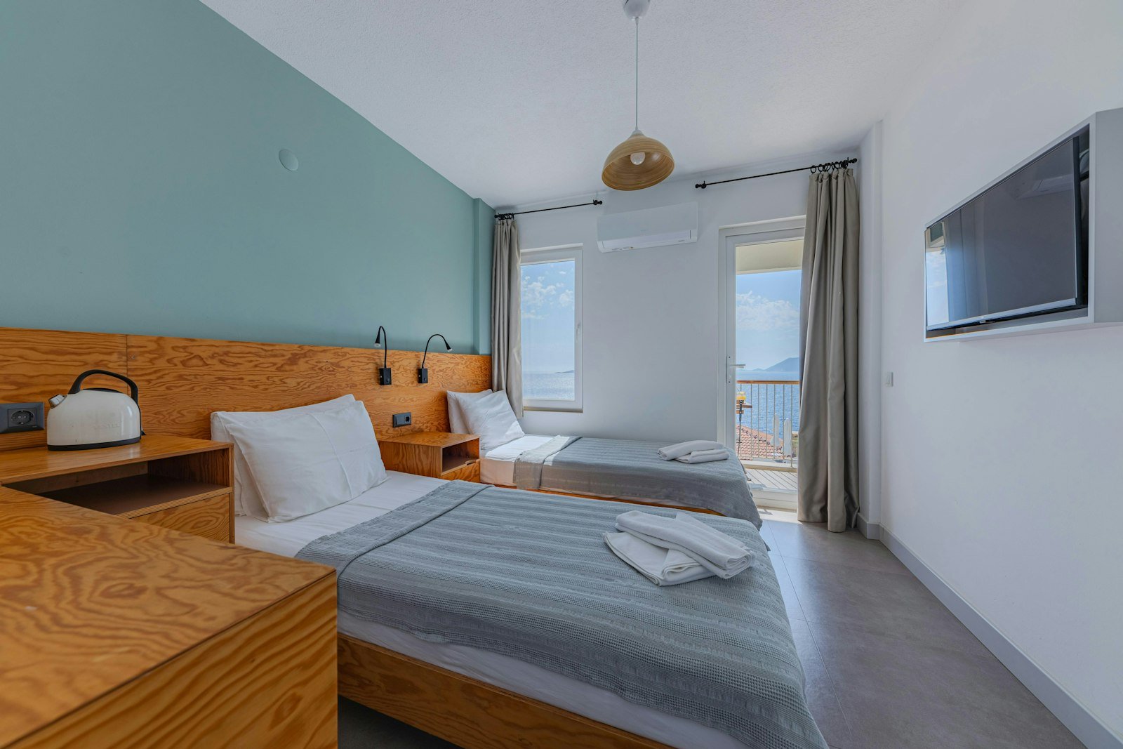 Bright comfortable hotel room with twin beds