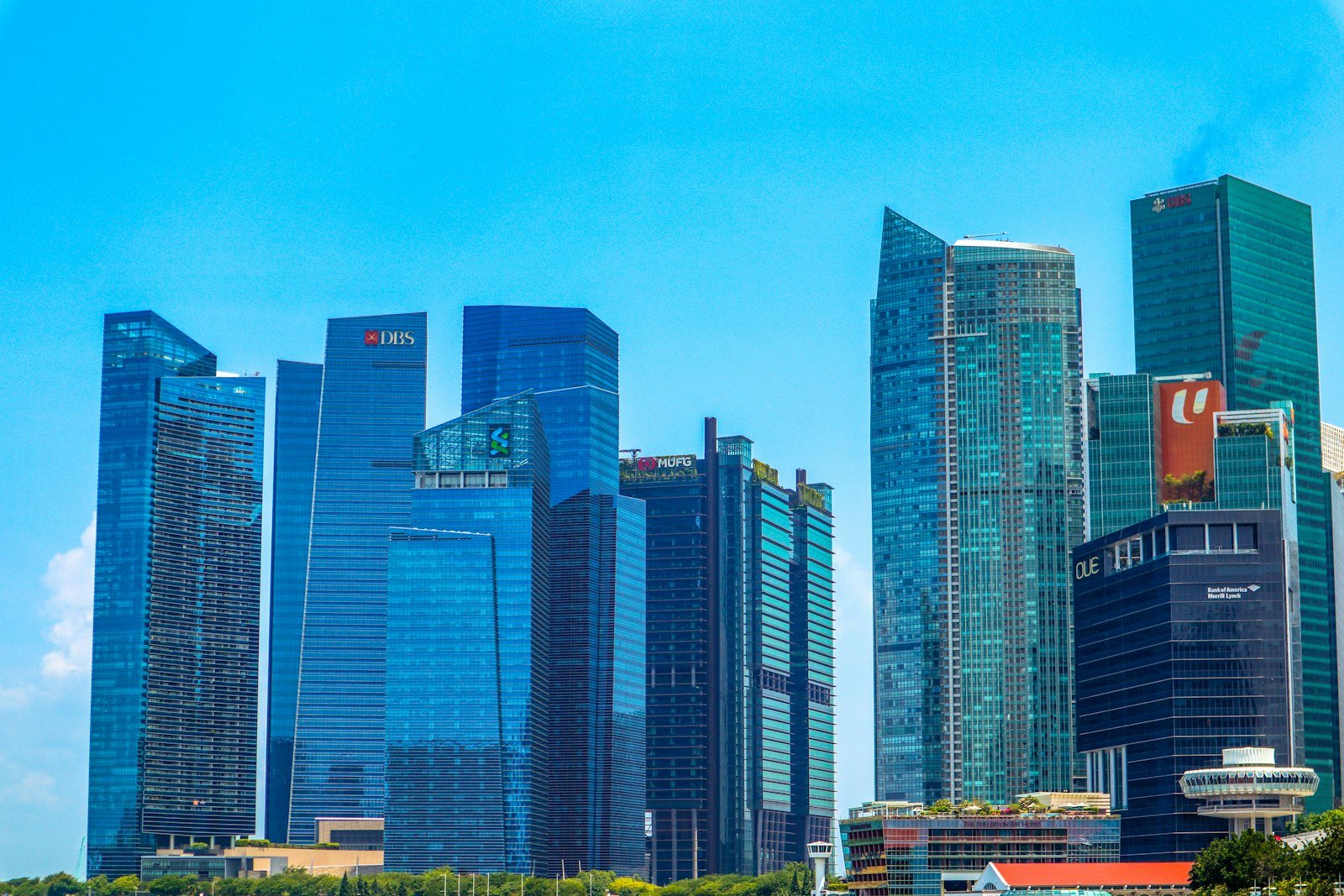 Singapore city buildings under a clear blue sky