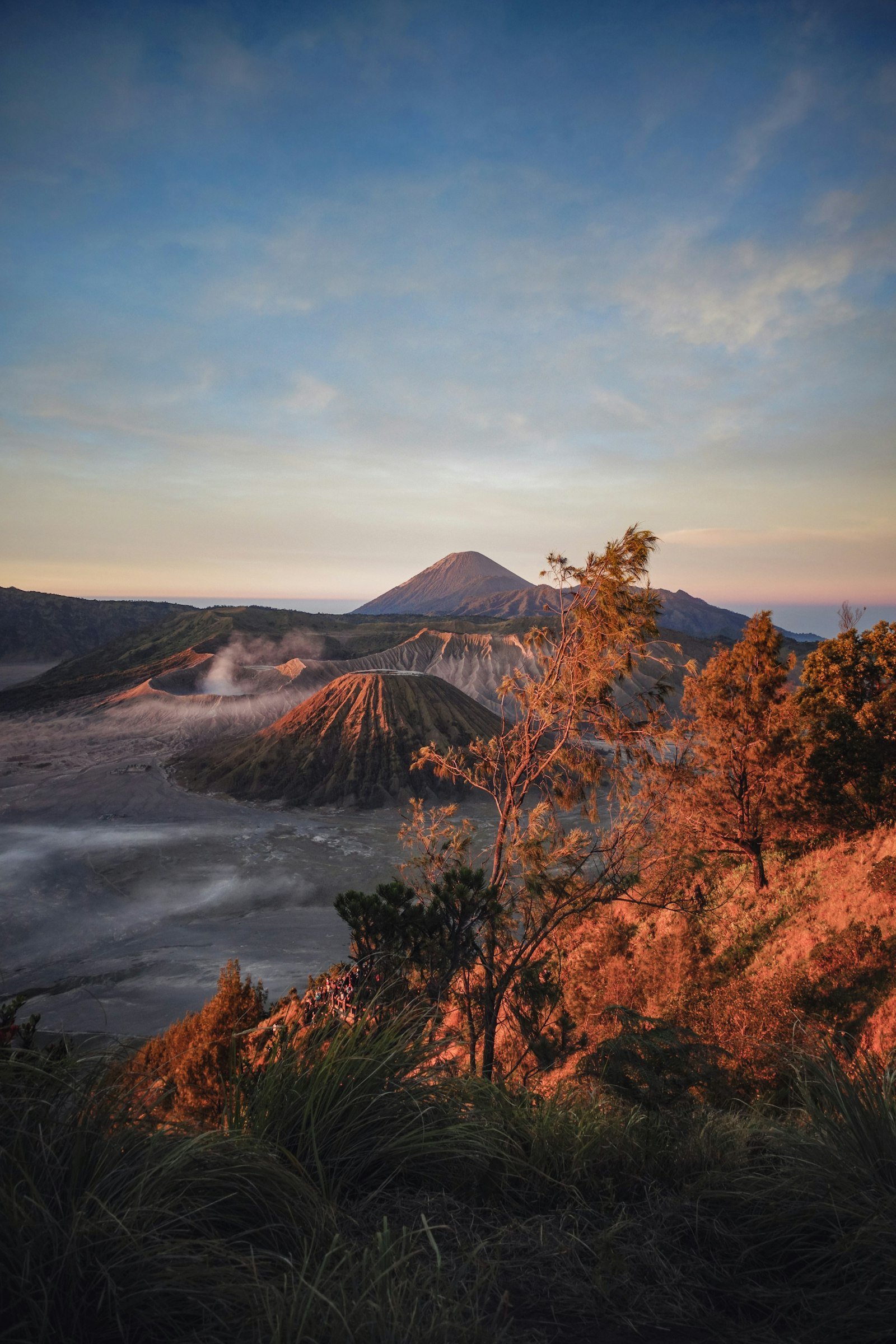 Mount Bromo rising above a misty volcanic landscape in East Java, Indonesia