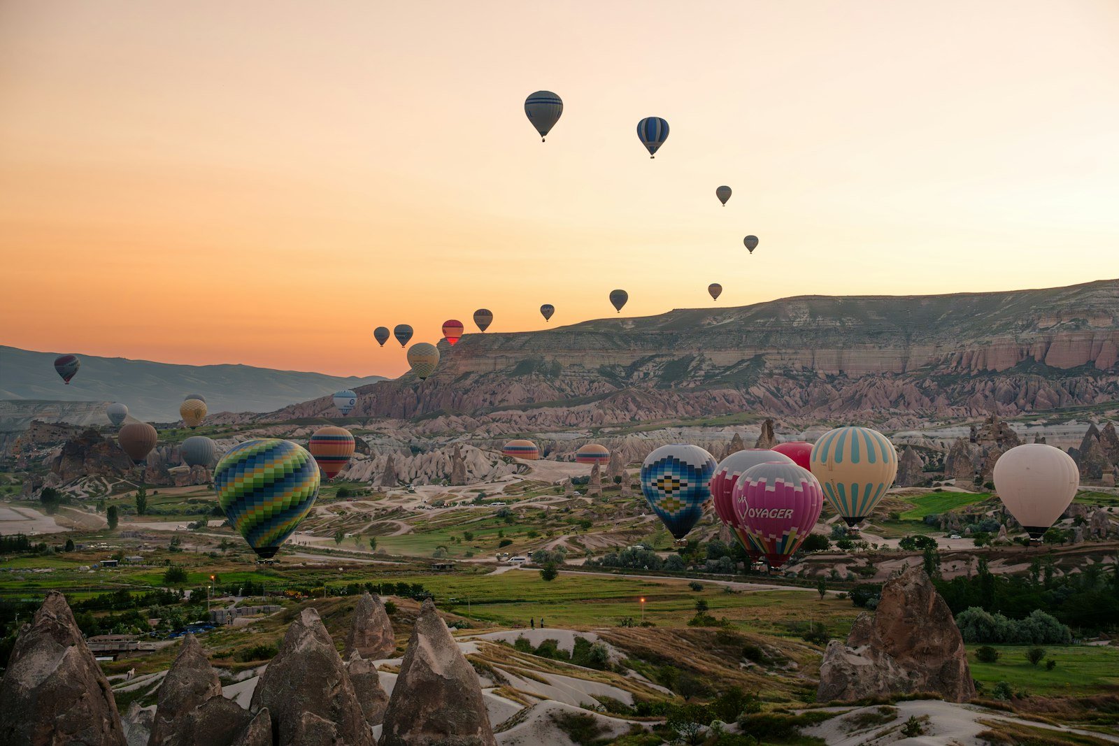 Hot air balloons over Cappadocia at sunrise