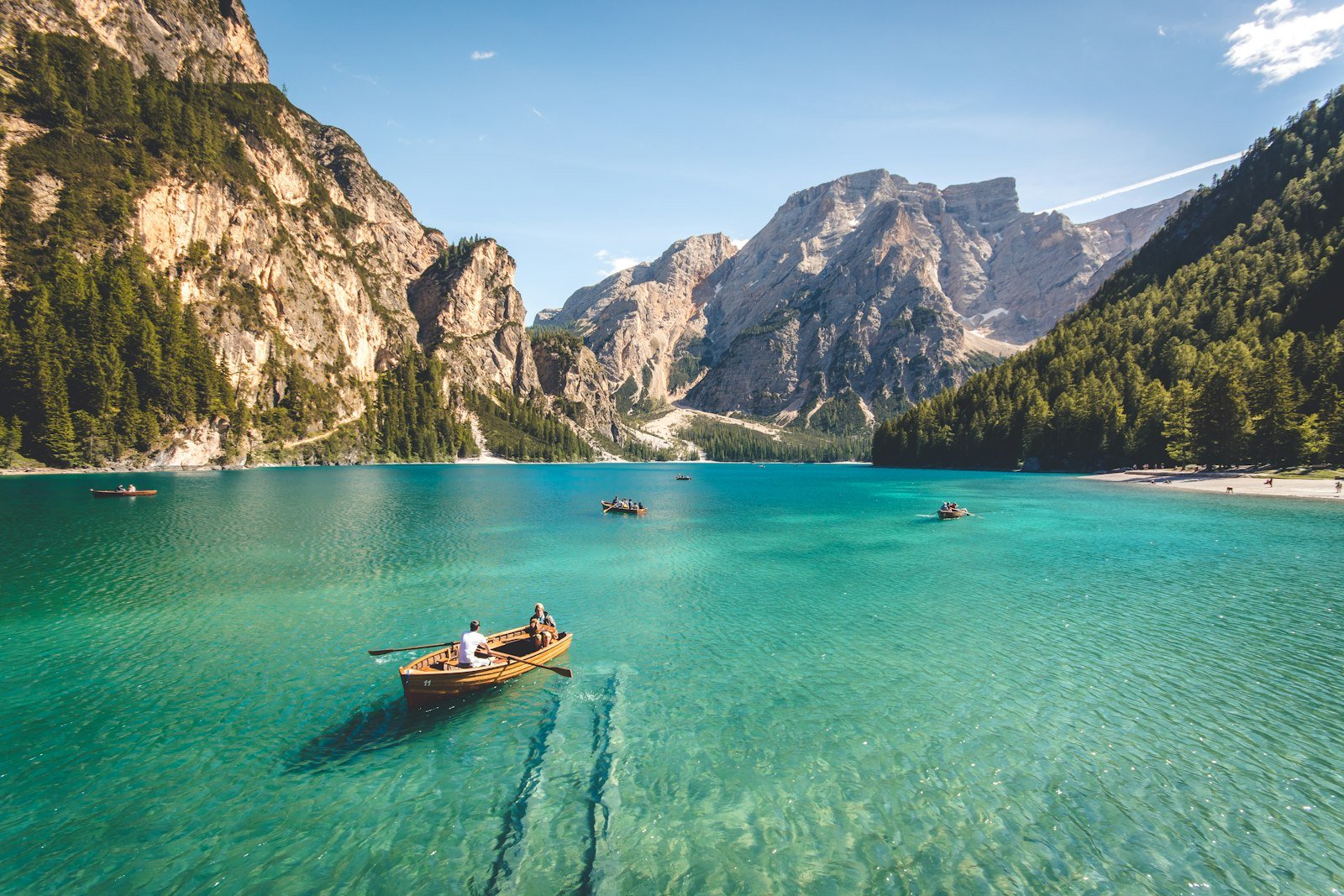 Traveller overlooking an immense mountain landscape on a premium tour