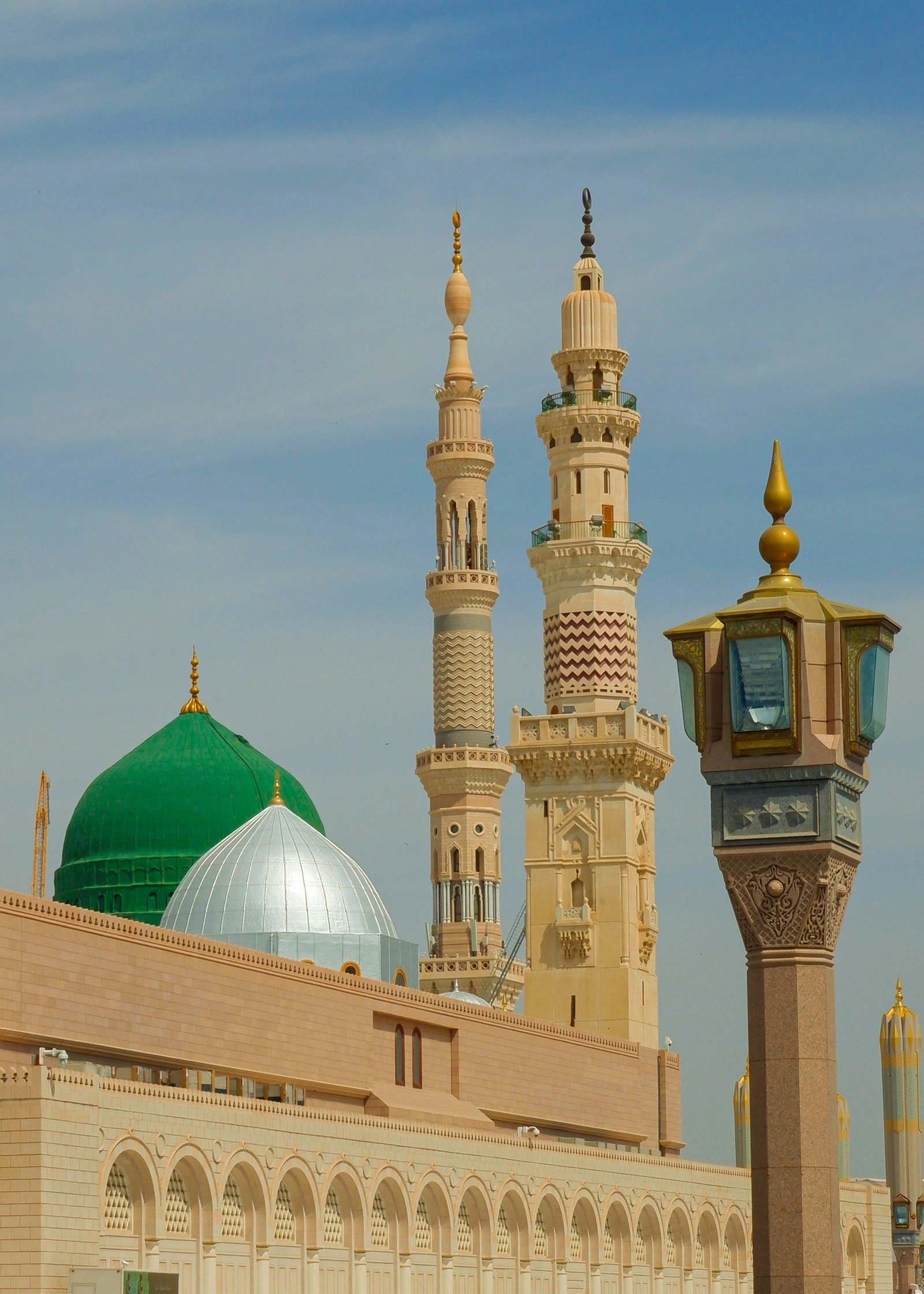 Masjid an-Nabawi in Madinah with its Green Dome and illuminated minarets
